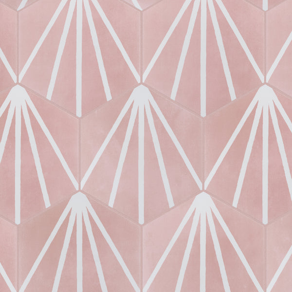 Geometric pattern of hexagonal tiles in soft pink, each featuring a white sunburst design radiating from one edge, creating a repeating, symmetrical motif across the image.
