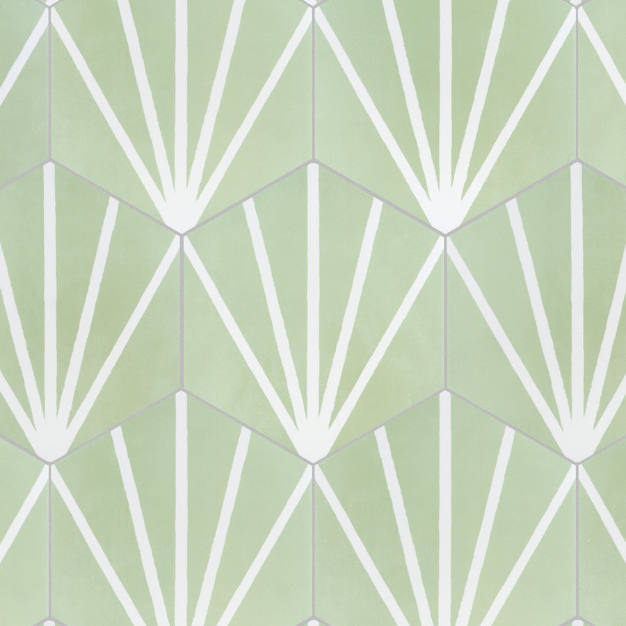 Geometric pattern featuring white lines radiating from a point on green hexagonal tiles, forming a fan-like or sunburst design. The background is a soft, pastel green.