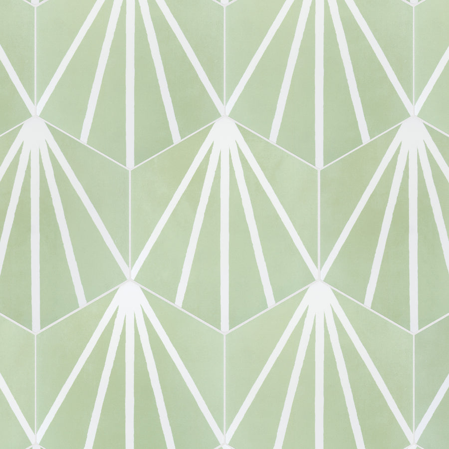 Geometric pattern with light green hexagons and white lines forming fan or sunburst shapes, creating a repeating symmetrical design on a soft green background.