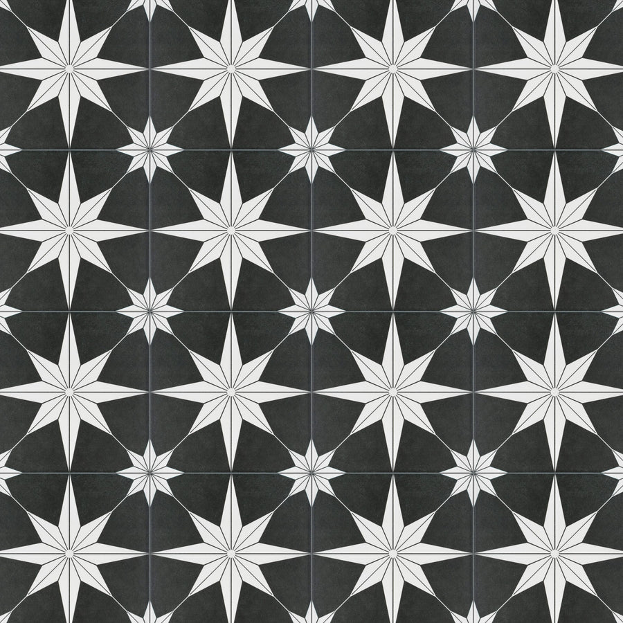 Black and white tile pattern featuring repeating eight-pointed stars. The stars are white with black outlines, set against a black background, creating a bold geometric design.