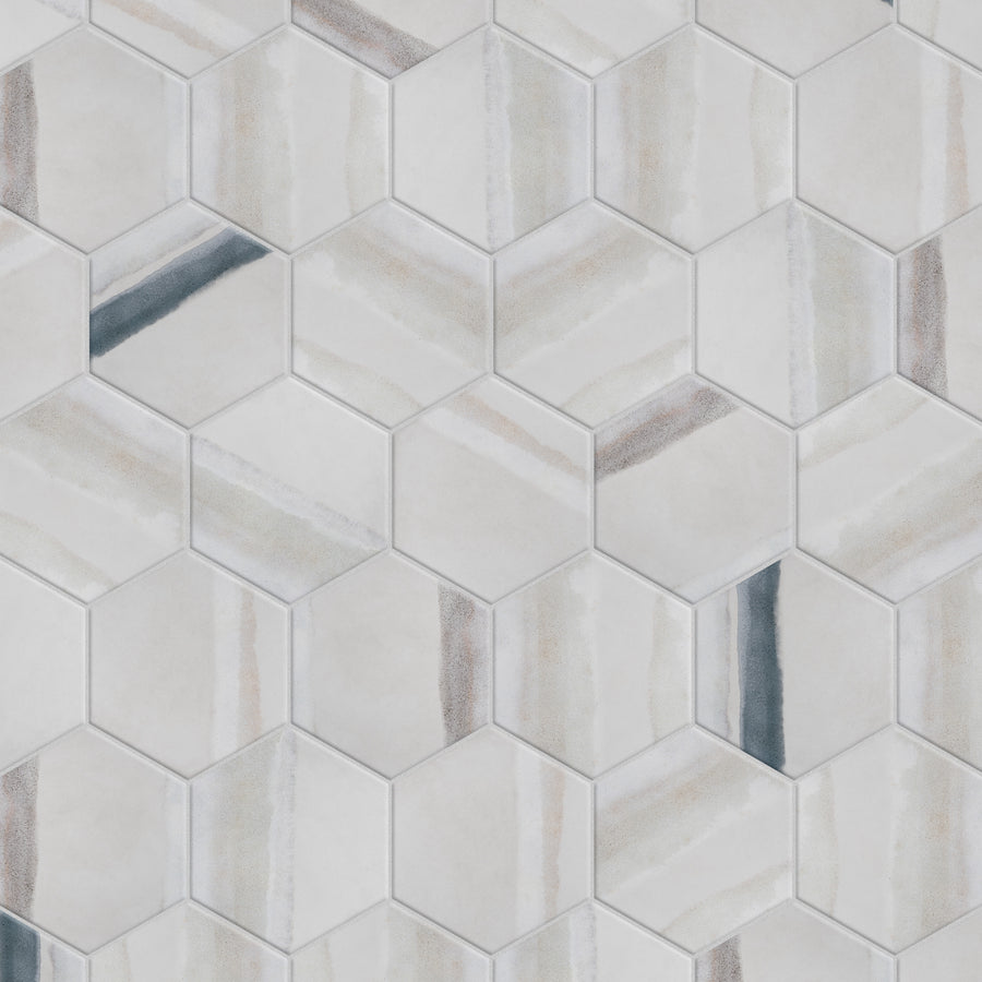Hexagonal ceramic tiles with a light gray and white color scheme, featuring subtle diagonal stripes in shades of beige, cream, and dark gray, arranged in a repeating geometric pattern.