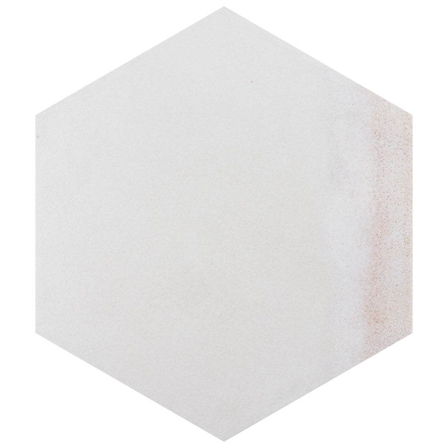 A white hexagonal tile with a subtle gradient of light brown shading along one edge, set against a plain white background.