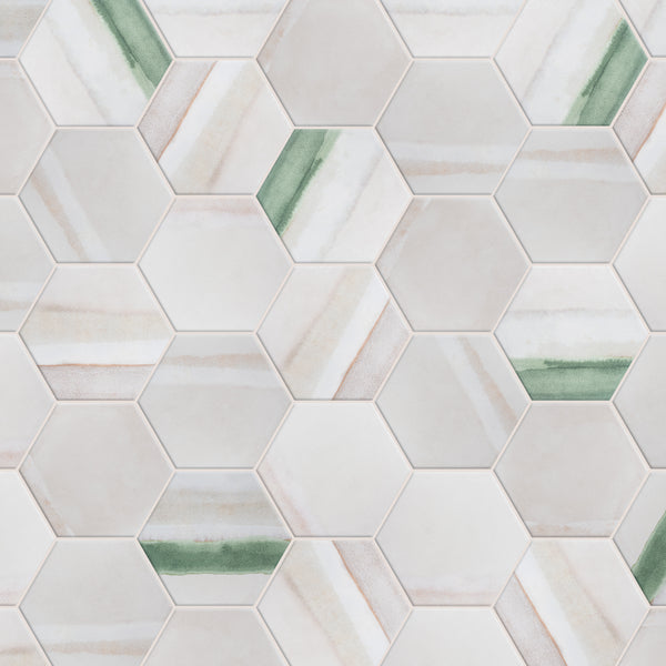 Hexagonal tiles in a repeating pattern, featuring mostly neutral beige and white tones with some tiles accented by diagonal green and tan stripes. The design creates a subtle, geometric look.