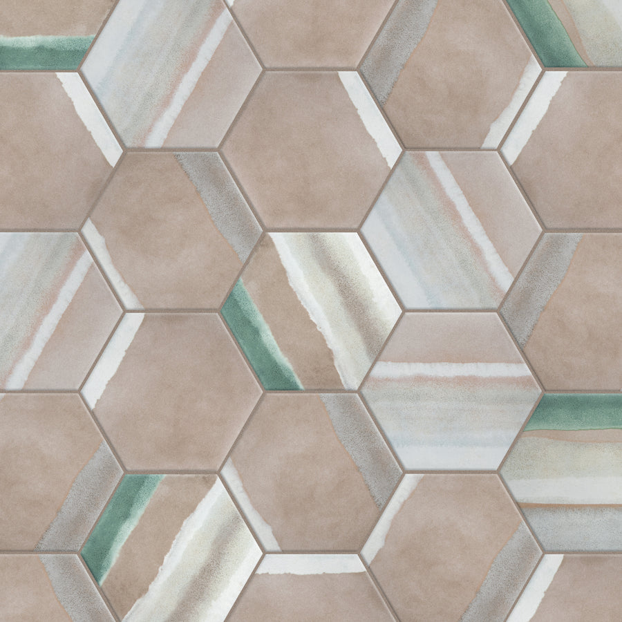 Hexagonal tiles with a mix of solid taupe and watercolor-like stripes in white, green, and blue shades, creating a geometric and artistic pattern.