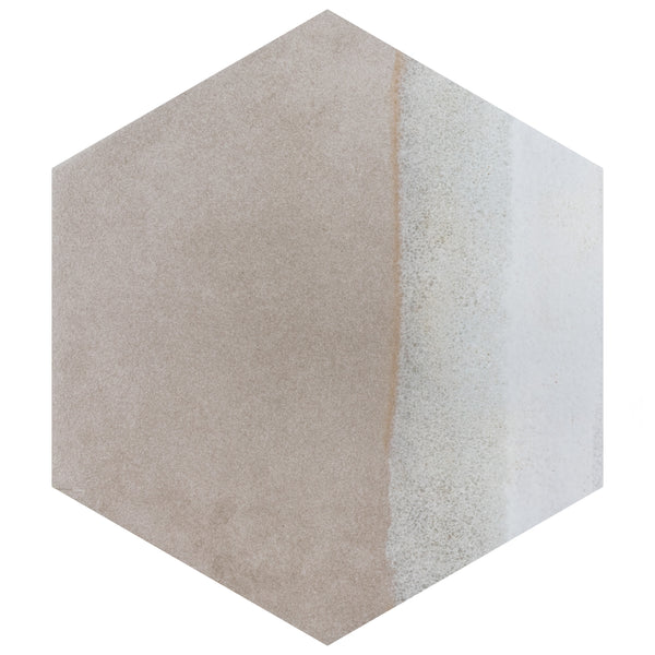 Hexagonal ceramic tile with a gradient pattern: light beige on the left blending into white and gray tones on the right, resembling natural stone or sand.