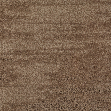Close-up of the Cirrus Berber Carpet in Fig, showcasing its textured surface and mottled pattern in rich brown shades—a plush, premium flooring choice.