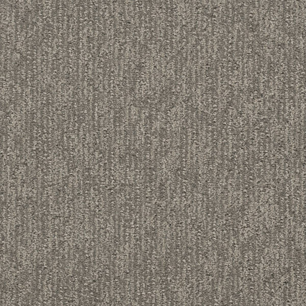 Close-up of Finishing Touch Berber Carpet in City View, featuring a textured gray surface with subtle vertical lines and a slightly speckled pattern—soft, evenly colored, and perfect for high-traffic areas in homes or offices.