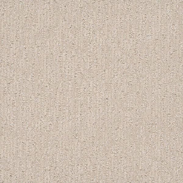 Close-up of the Finishing Touch Berber Carpet in Macaroon—featuring soft, looped fibers and a subtle, uniform pattern. Its durable construction makes it perfect for high-traffic areas.