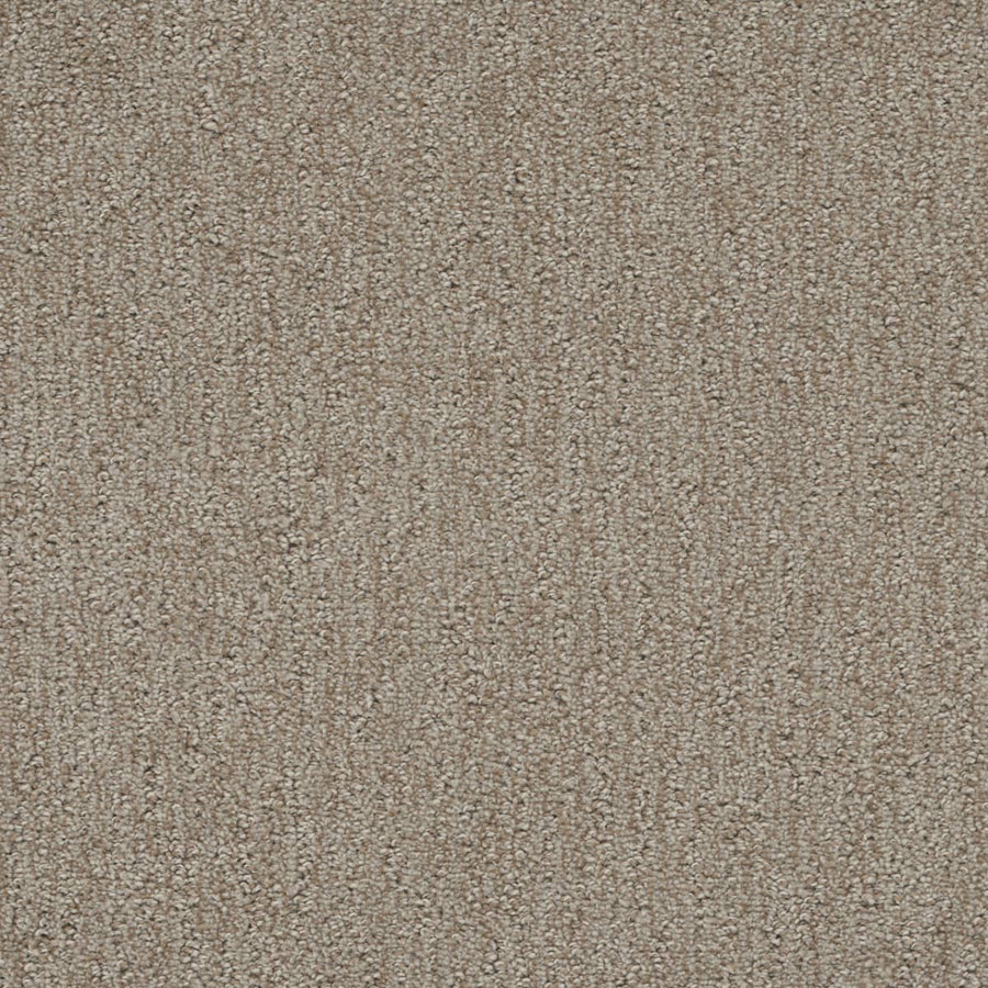 Close-up of Finishing Touch Berber Carpet in Old Soul: textured beige with a subtle, uniform pattern and short, tightly woven fibers—perfectly durable for high-traffic areas.