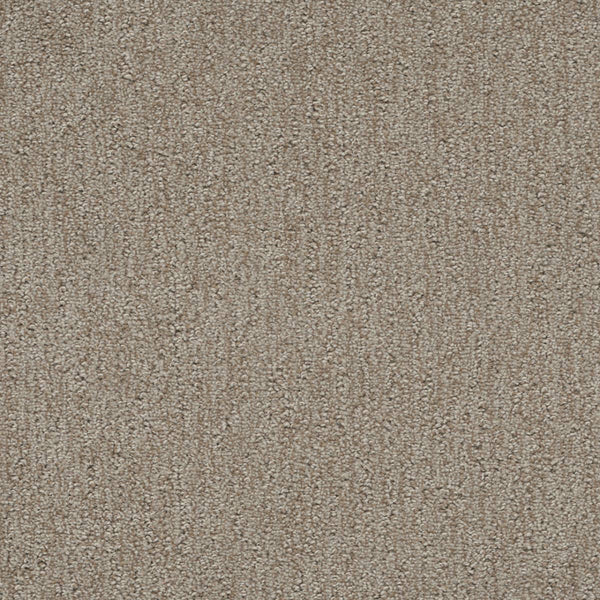 Close-up of Finishing Touch Berber Carpet in Old Soul: textured beige with a subtle, uniform pattern and short, tightly woven fibers—perfectly durable for high-traffic areas.