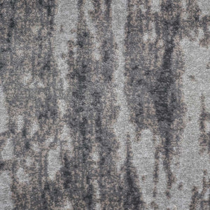 Arabella On Trend Carpet in Flannel features a textured surface with an abstract, mottled gray and brown pattern, evoking weathered stone—perfect for elegant flooring with timeless style and unique vertical streaks.