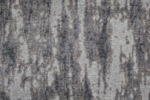 Arabella On Trend Carpet in Flannel features a textured surface with an abstract, mottled gray and brown pattern, evoking weathered stone—perfect for elegant flooring with timeless style and unique vertical streaks.