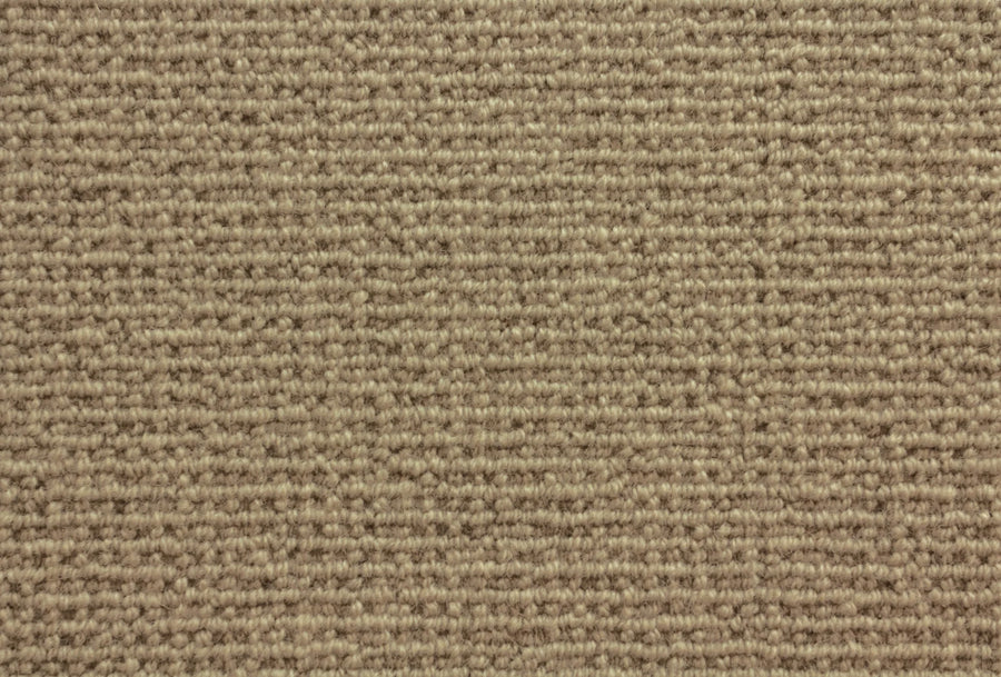 Close-up of Sequoia Berber Carpet in Flannel color, featuring tightly woven, horizontal looped fibers for a soft, textured surface. Crafted from premium materials—perfect for durable flooring in homes or offices.