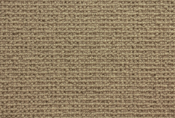 Close-up of Sequoia Berber Carpet in Flannel color, featuring tightly woven, horizontal looped fibers for a soft, textured surface. Crafted from premium materials—perfect for durable flooring in homes or offices.