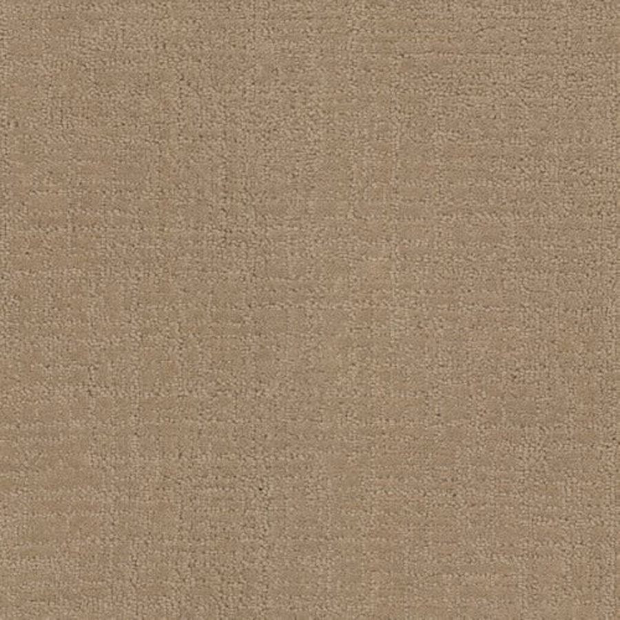 A close-up of the Bangladesh On Trend Carpet in Flax reveals a textured beige surface with a subtle woven pattern, showcasing soft elegance and refined craftsmanship.