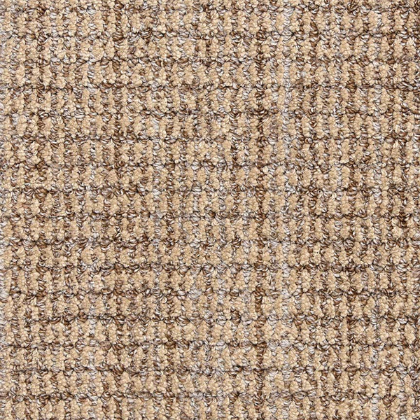 Close-up of Aspen Berber Carpet in Flax color, featuring a tight, looped weave with a grid-like pattern for a durable, textured surface.