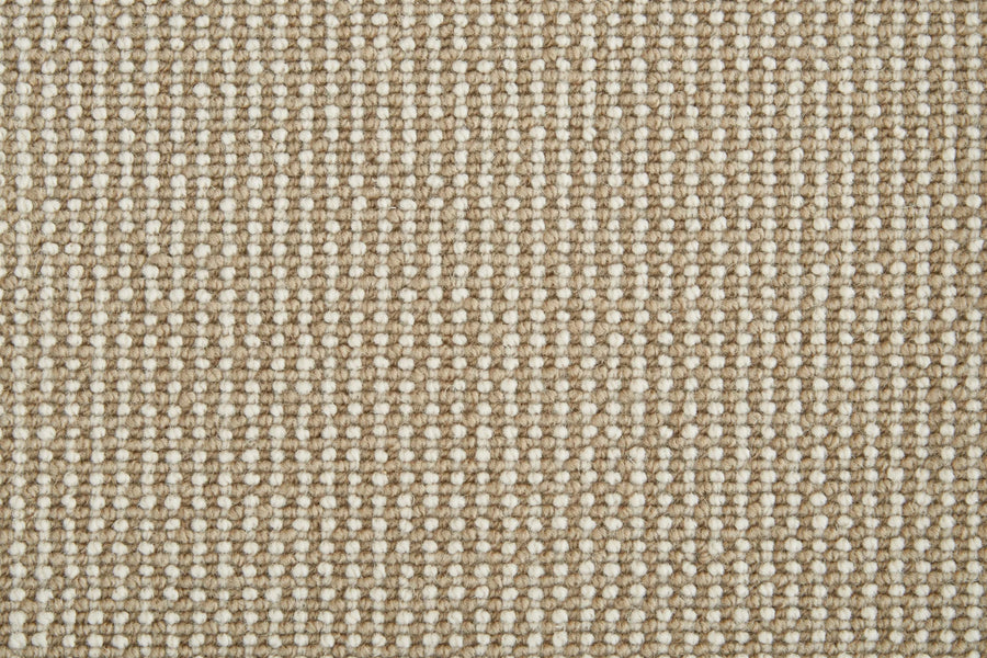 Close-up of the Harper Berber Carpet in Flax, featuring a beige and off-white checkered pattern with a textured, tightly woven surface for everyday durability and timeless style.