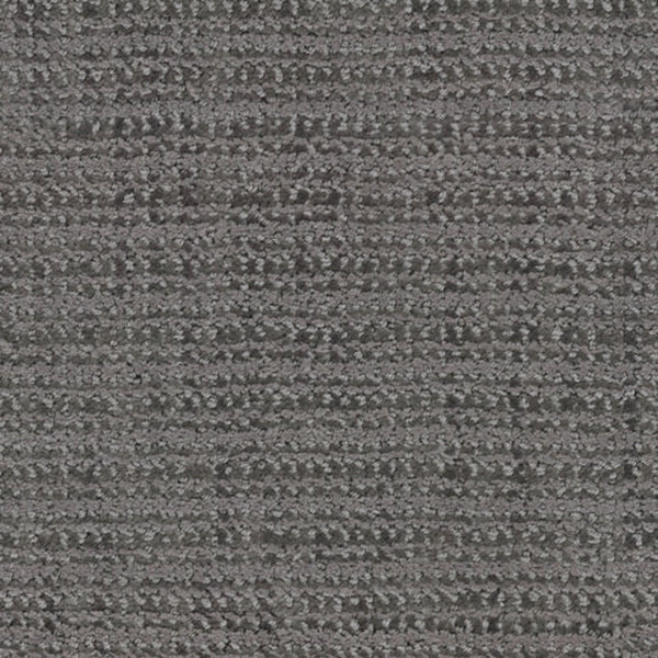 Close-up of Beguiling Berber Carpet in Flint—textured gray with a subtle horizontal linear pattern. The soft, slightly raised surface displays varied gray shades throughout.