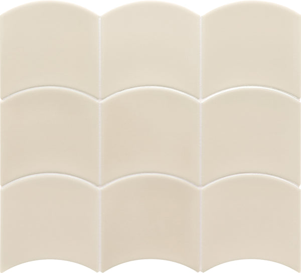 The Flow Motion 5x5 Glazed Ceramic Tile is a premium, cream-colored tile with a unique scalloped top edge, creating a repeating wave pattern when arranged in a grid.