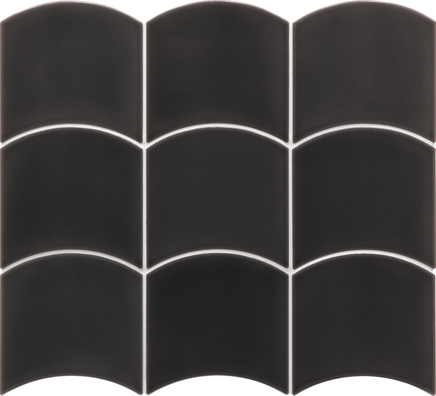 The Flow Motion 5x5 Glazed Ceramic Tile showcases a premium black mosaic of rounded arch shapes with straight sides, arranged in two rows of three. White grout outlines each tile to form a striking, modern grid pattern.