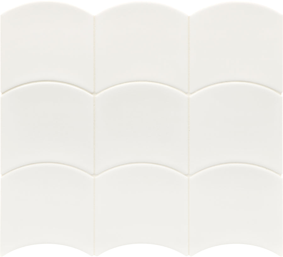 Flow Motion 5x5 Glazed Ceramic Tiles feature a unique scalloped shape arranged in a grid, creating a smooth, glossy surface with a dynamic wave-like pattern.