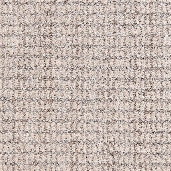Close-up of Aspen Berber Carpet in Fog color featuring a soft, uniform surface with tightly woven looped pile for a durable, grid-like textured finish.
