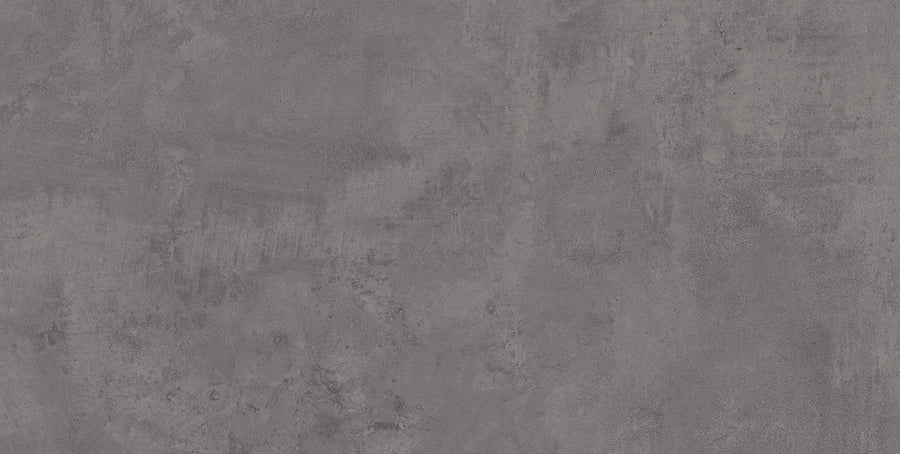 Forge 24x48 Rectified Porcelain Tile features a matte gray finish with a rough, textured surface marked by patches, smudges, and subtle streaks for an industrial, weathered concrete look.