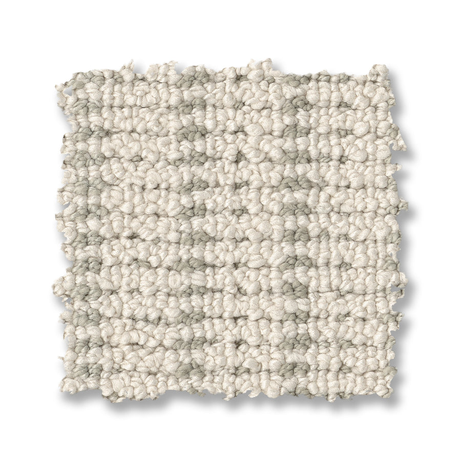 A square swatch of Laken On Trend Carpet, light beige with a textured loop and woven look, is shown on a white background. This carpet delivers a luxurious feel, perfect for premium interiors.