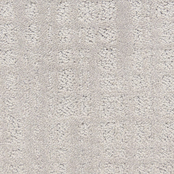 The Willow Lake On Trend Carpet in Frozen features a subtle, textured geometric pattern with small, raised rectangles—ideal for high-traffic areas and adding sophisticated style to any space.