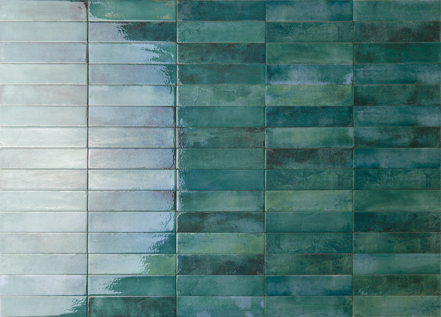 Rectangular green and blue tiles arranged in a horizontal grid, with a glossy finish and a gradient effect that transitions from lighter tones on the left to darker shades on the right.
