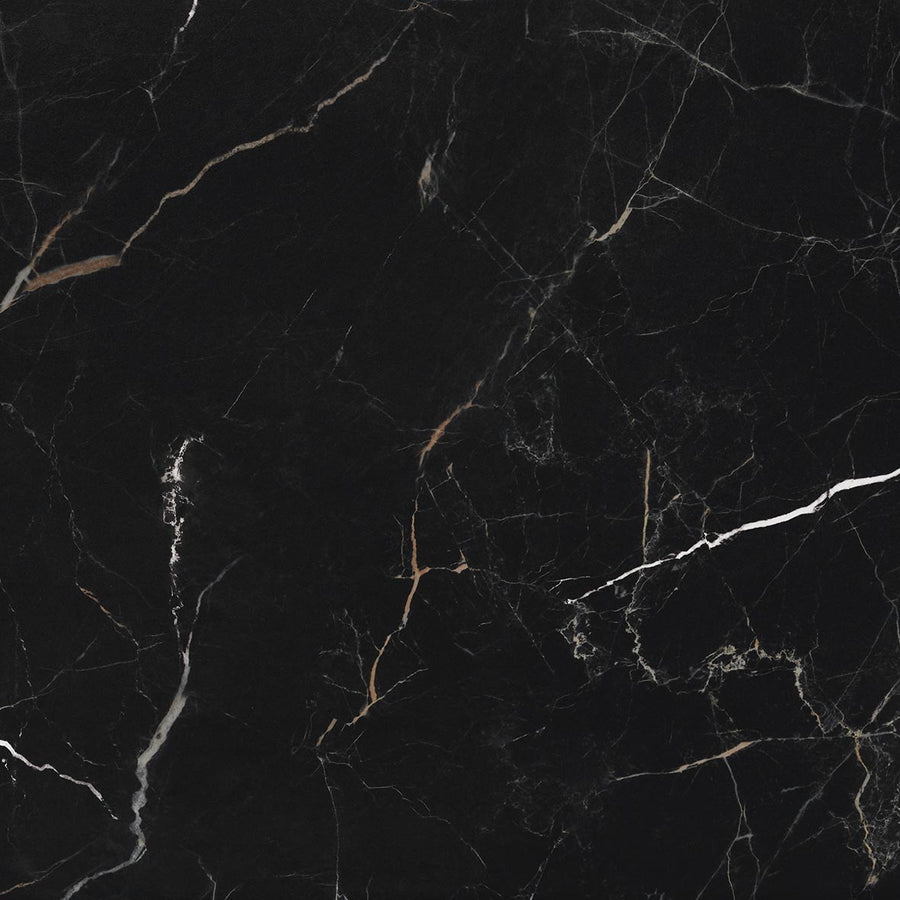 A close-up of Palazzo 12x12 Glazed Porcelain Tile reveals a dramatic black marble surface with thin, irregular white and gold veins—an elegant, natural stone look ideal for seamless monocaliber installation.