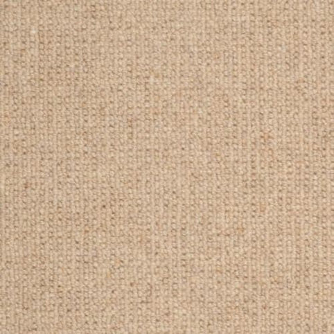 Close-up of the Dublin Berber Carpet in Gallaher, featuring a soft, beige knit with a uniform, textured pattern of small stitches—ideal for adding cozy style to any home.