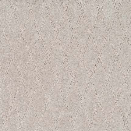 The Absolute Berber Carpet in Genuine features a beige, textured surface with a subtle diamond pattern formed by stitched lines, offering durability and softness ideal for high-traffic areas.
