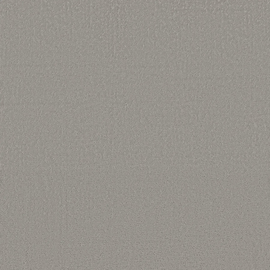 A close-up of the Gateway Gray Crafted Tone Blue Pet Friendly Carpet shows its smooth, fine-grain texture and stain-resistant surface, creating a neutral, even look ideal for any space.