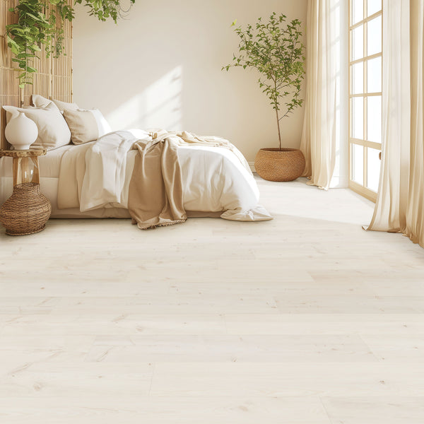 A bright, minimalist bedroom features Glacial Isle 8 11/32