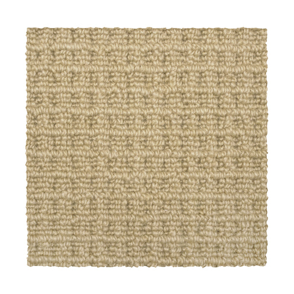 A close-up of a square swatch of Glen Abbey II Berber Carpet in Sudan showcases its beige, looped grid-like weave. The swatch has clean-cut edges against a white background, highlighting this elegant flooring option.