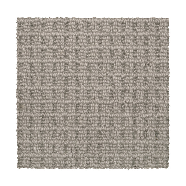 A square sample of Glen Abbey II Berber Carpet in Mushroom, featuring textured gray tones and a subtle basket-weave pattern, is displayed elegantly on a white background.
