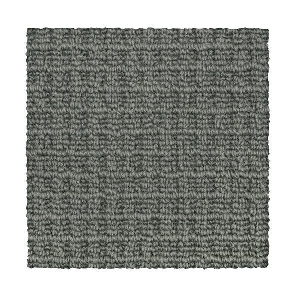 A square sample of Glen Abbey II Berber Carpet in Graphite, featuring a subtle grid-like texture and tightly woven fibers, is shown on a white background—offering a stylish and durable flooring option.