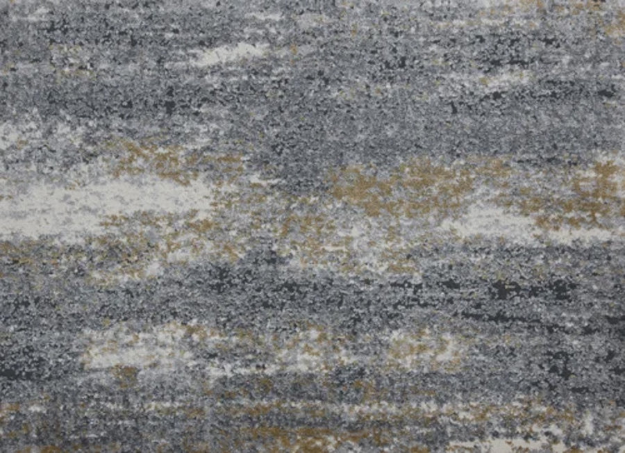 A close-up of Rock And Roll On Trend Carpet in Golden showcases a textured, mottled pattern designed for high-traffic areas, adding an abstract style to any space.