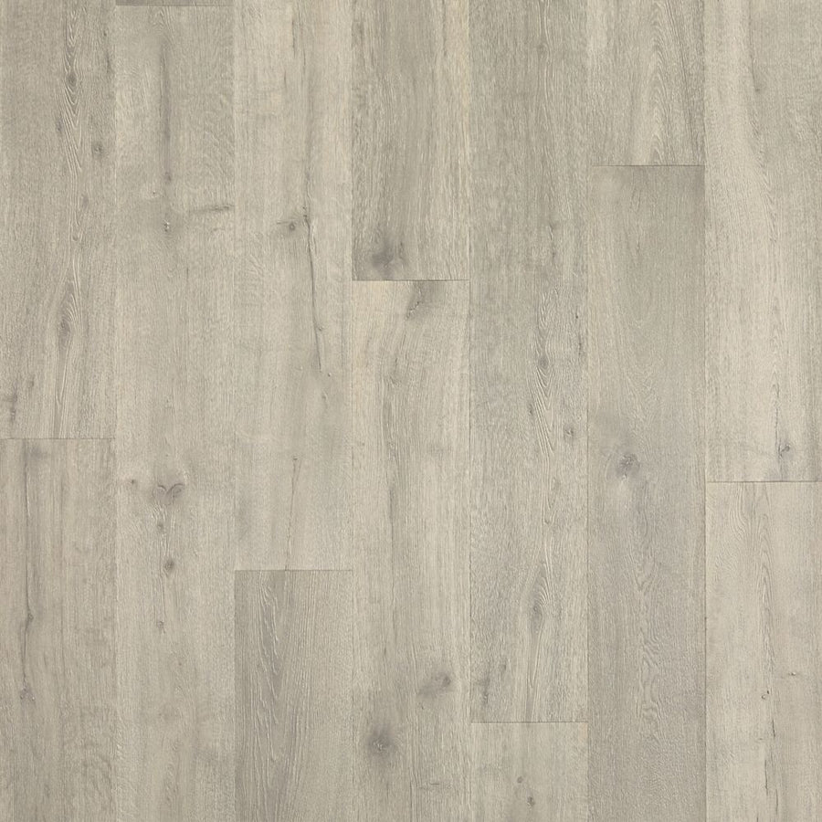 Native Ridge 7.5" Vinyl Plank offers light gray premium vinyl flooring with a subtle grain, matte finish, and natural-looking knots on 7.5" wide planks for a modern, clean look.