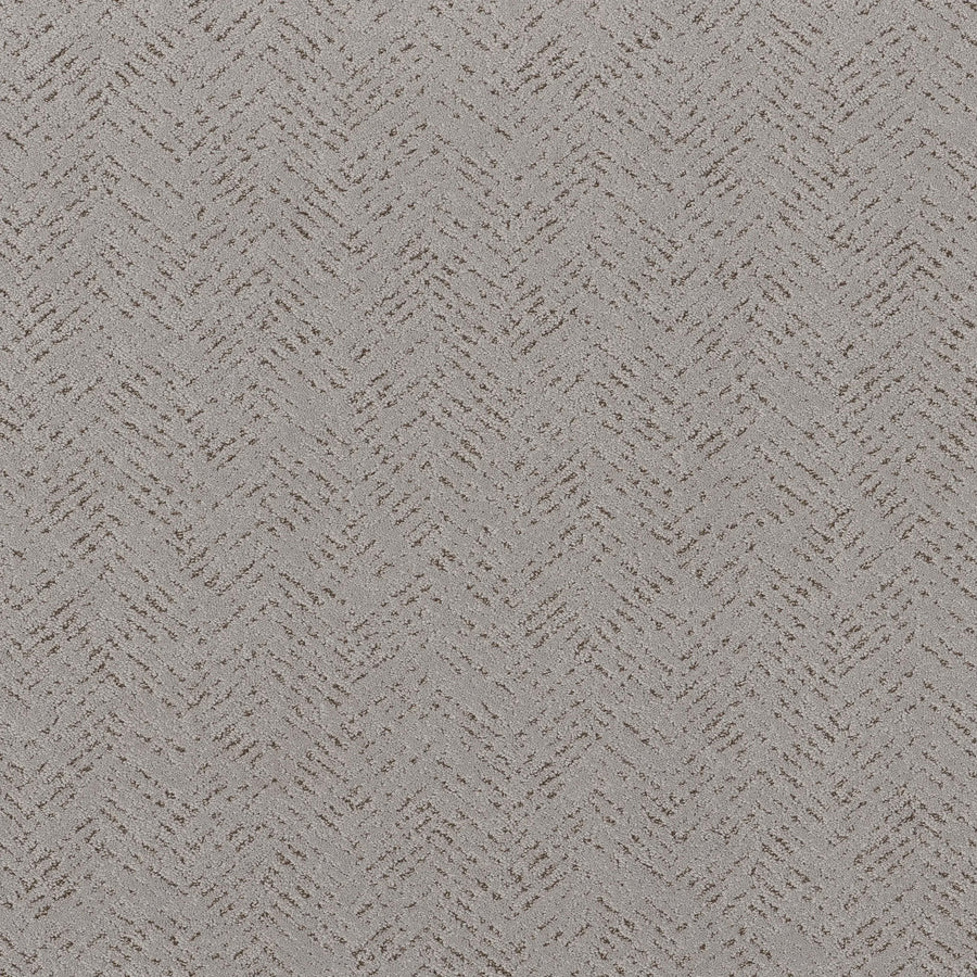 Close-up of Favoured Path Pet Friendly in Gravity, showcasing a soft, fabric-like textured surface with a subtle repeating herringbone pattern in light grey—perfect for contemporary style flooring in modern spaces.