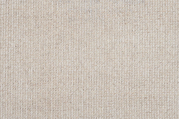 Close-up of Henderson On Trend Carpet in Champagne. This luxurious carpet features a soft, textured woven pattern with subtle grid-like design, highlighting its premium construction and slight yarn variations.