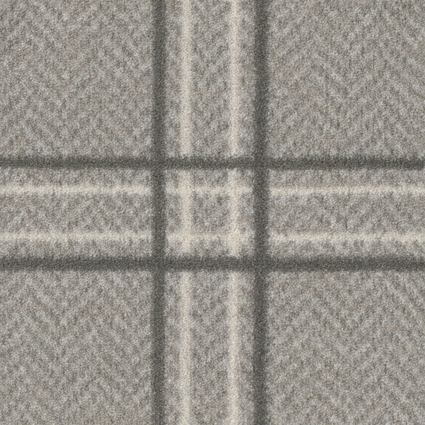 Close-up of Herrington On Trend Carpet in Grey Fell—a durable wool with herringbone texture and large plaid, perfect for luxury contemporary spaces or high-traffic areas.