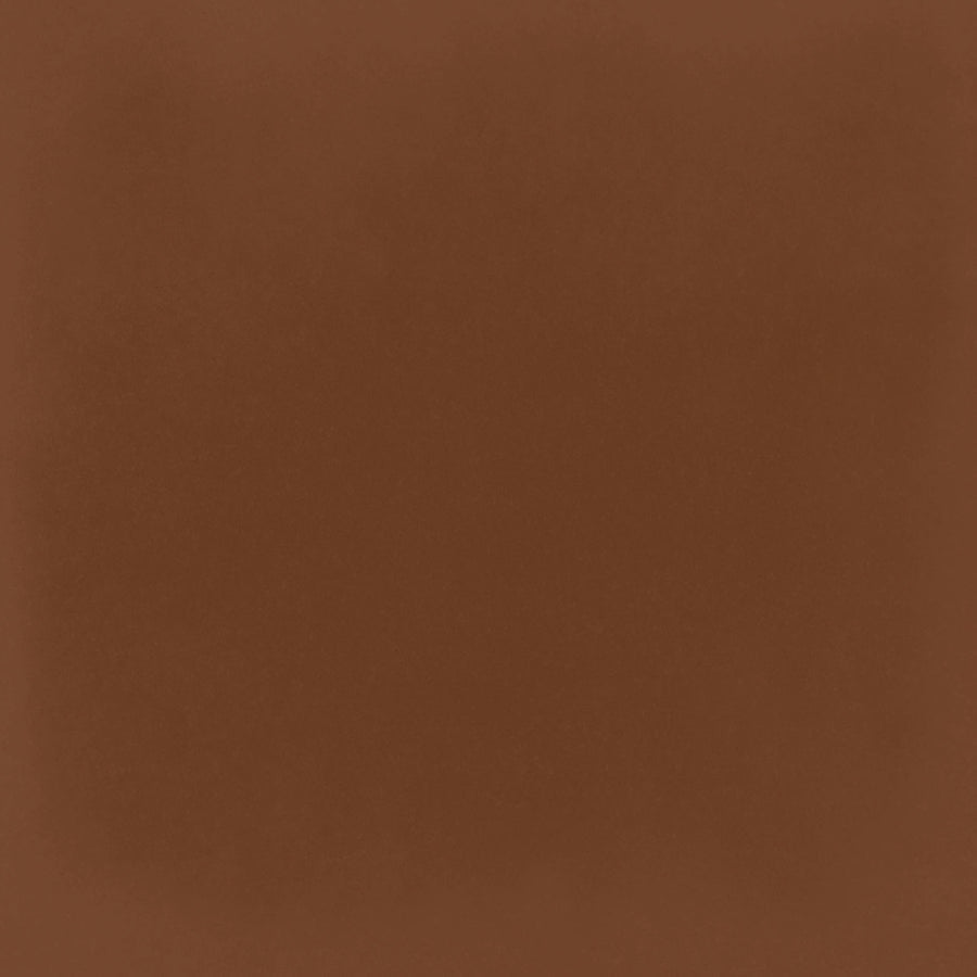 The Harmony 5x5 Porcelain Tile in Cotto displays a rich, even medium brown tone across the entire surface, reminiscent of handmade tile warmth. No patterns or textures appear—just pure, solid color throughout.