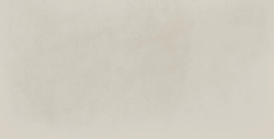 The Harmony 2.5x5 Porcelain Tile features a light beige, textured surface with gentle, paper-like variations—ideal as inspiration for unique or handmade tile designs.