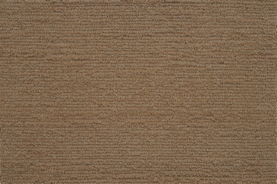 A close-up of Highlands Berber Carpet in Barley shows its brown textured surface with horizontal ridges, creating a uniform, repeating pattern—ideal for contemporary, durable flooring that feels comfortable underfoot.