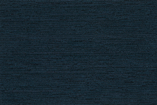 Highlands Berber Carpet in Inkwell features a dark blue, subtly mottled texture with horizontal lines, creating a soft, woven look—perfect for contemporary flooring that’s both stylish and comfortable underfoot.