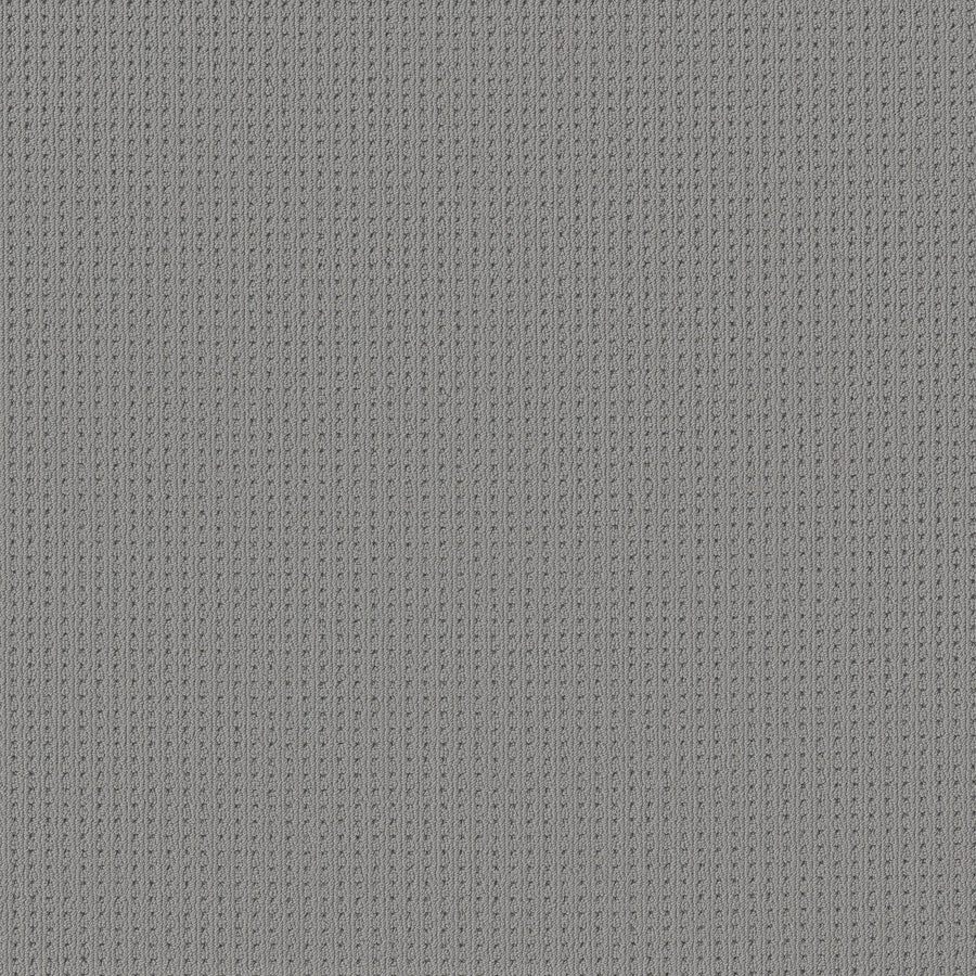 Close-up of San Lucas Family Friendly Carpet in Half Moon color, showing a grey vertical ribbed knit texture—durable and comfortable, perfect for high-traffic family homes.