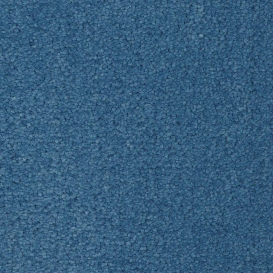 Close-up view of the Seduction On Trend Carpet in Harbor View, featuring a textured, dense looped pile that provides both soft comfort and durable flooring.