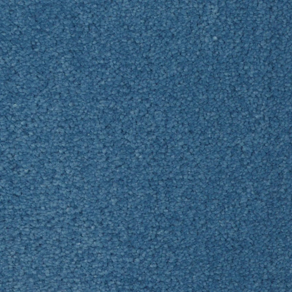Close-up view of the Seduction On Trend Carpet in Harbor View, featuring a textured, dense looped pile that provides both soft comfort and durable flooring.